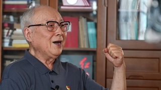 把一生融入这面“红旗”