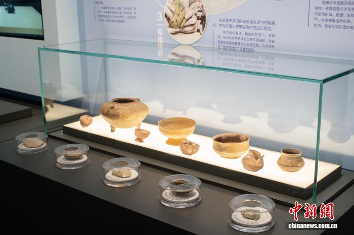 广西推出文物保护修复展 科技赋能让文物“活起来”