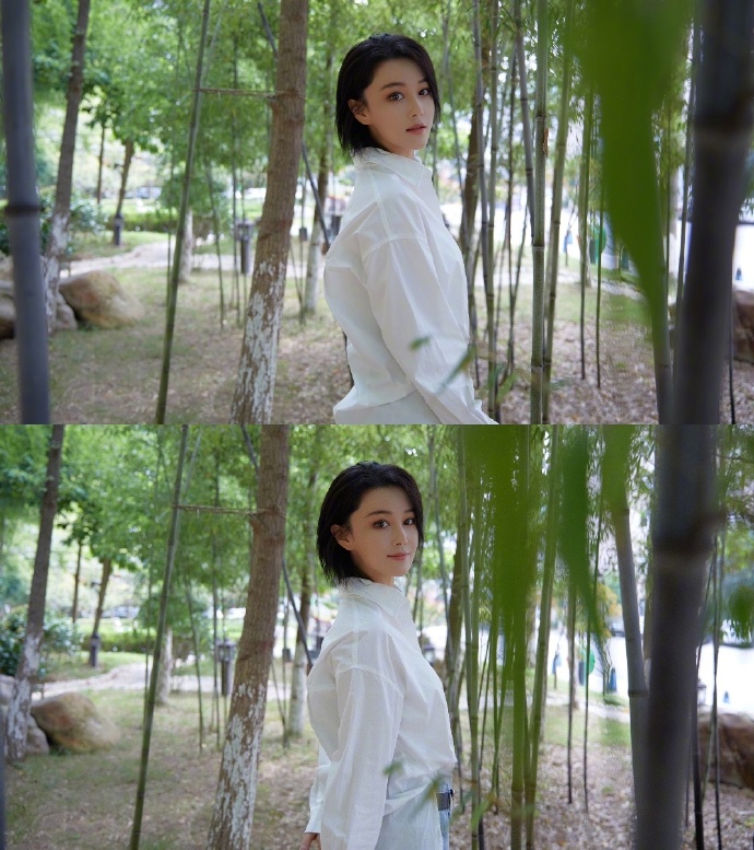 张馨予穿白衬衫清新靓丽 回眸甜笑超撩人