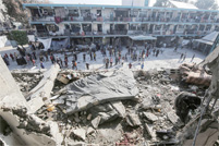 以军空袭加沙难民营学校，至少40人死亡